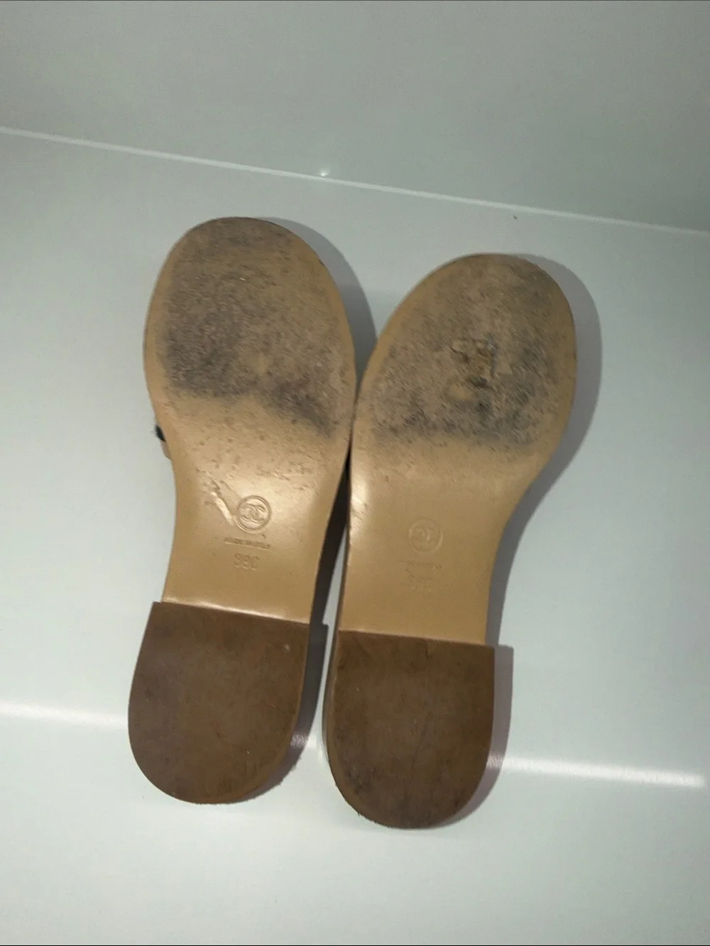 CHANEL Tan and Black Quilted Logo Slide Mules